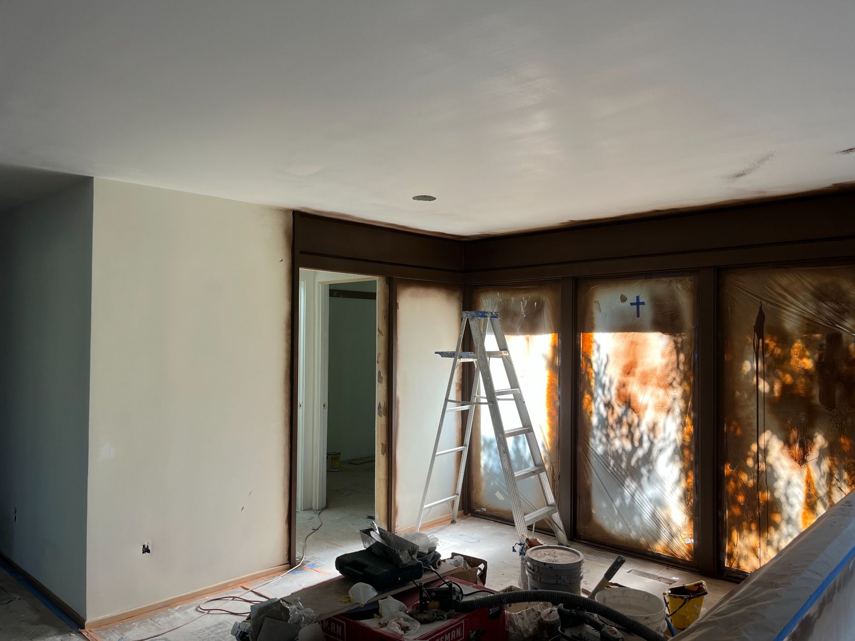 Protected openings and detailed prep before painting