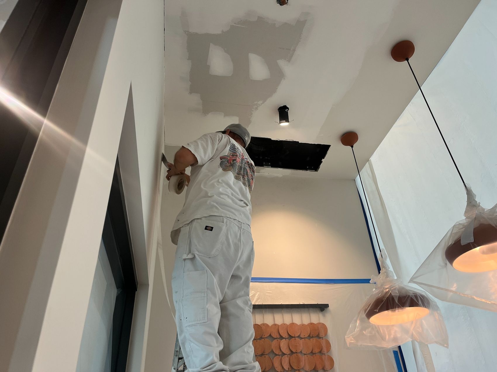 Existing wall color protected for repainting