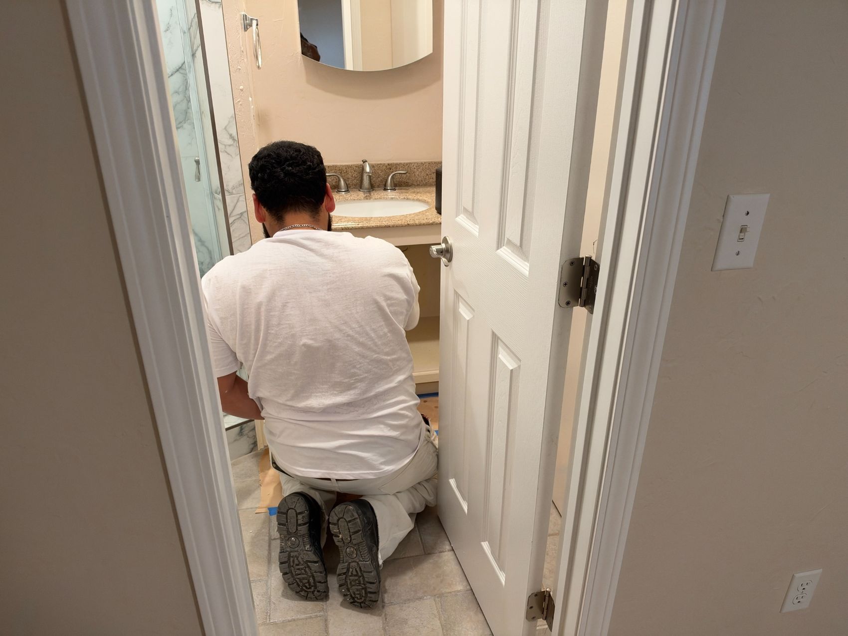 Crew member working on interior finishing details